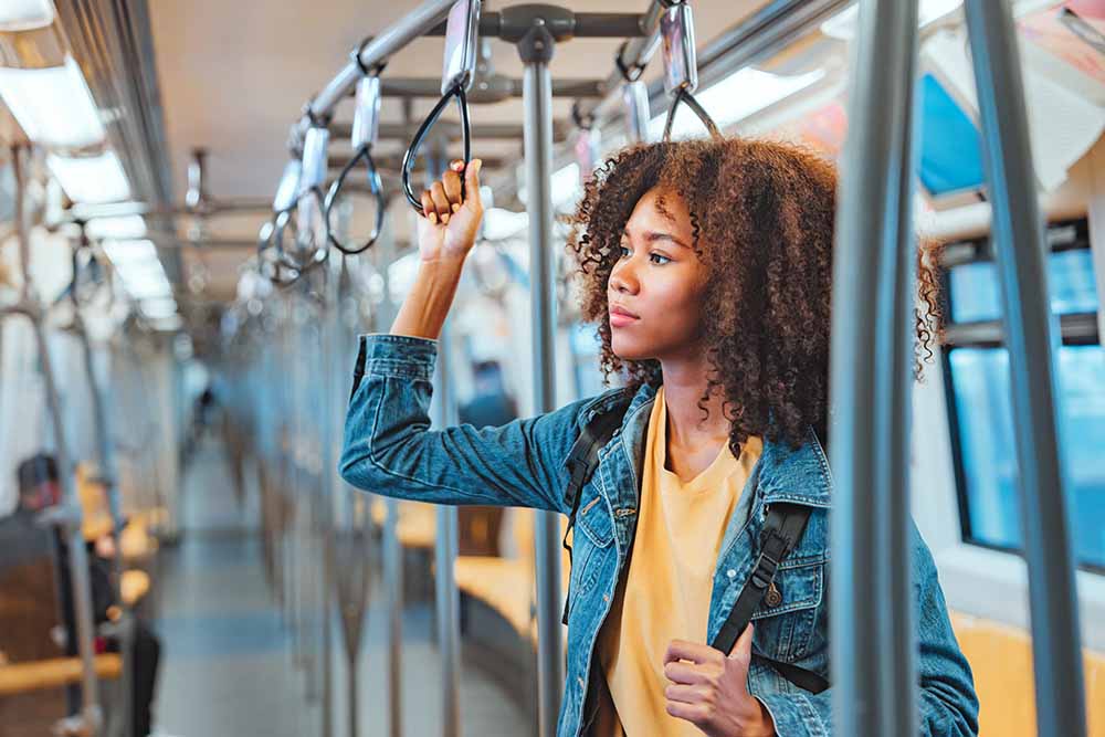 Young woman in subway train